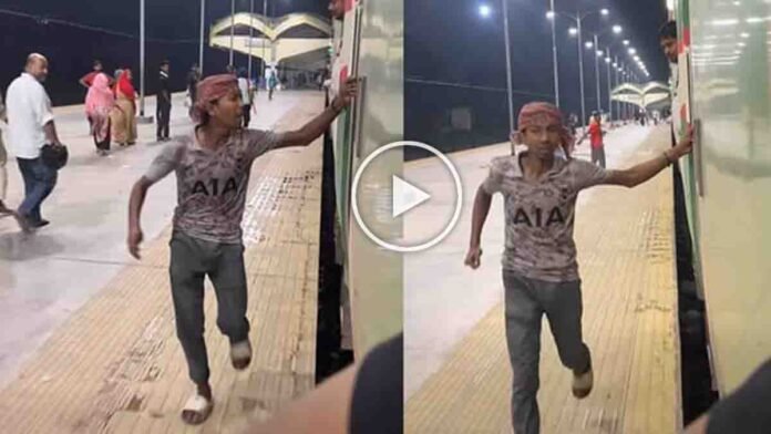 Railway vendor running behind a moving train after a passenger refused to pay for his service, captured in a viral video