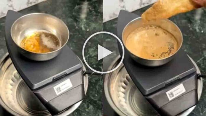 A man preparing tea using an upside-down electric iron box in a viral social media video