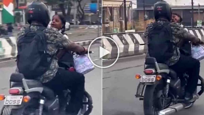 Father riding bike with daughter seated unsafely on the fuel tank, viral video sparks criticism
