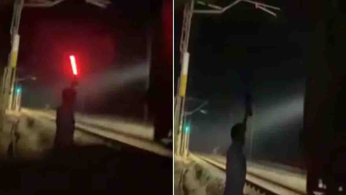 Two students in Kerala illegally stopping a moving express train by showing a red signal for an Instagram Reel