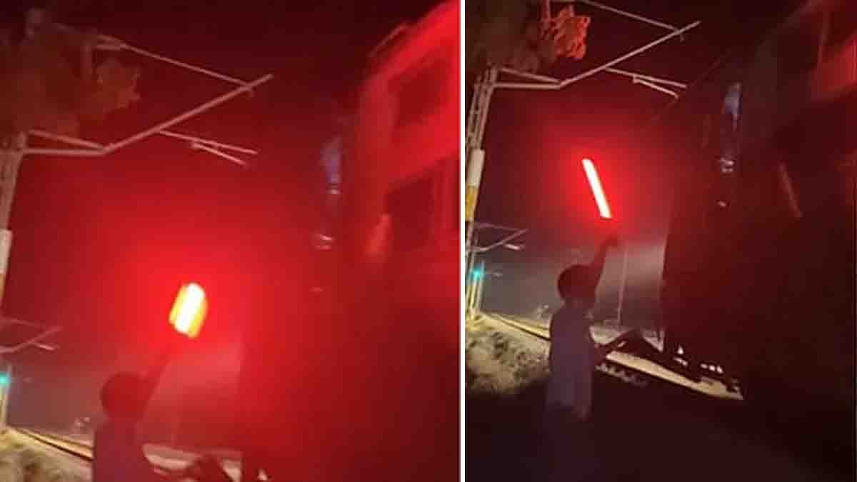 Two students in Kerala illegally stopping a moving express train by showing a red signal for an Instagram Reel