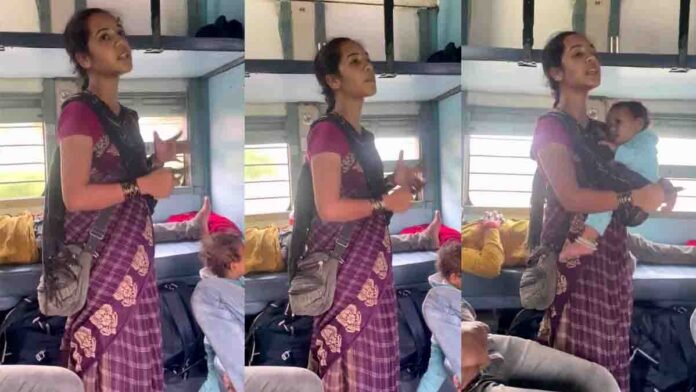 Mother holding her baby and singing a patriotic song inside an Indian train in a viral video