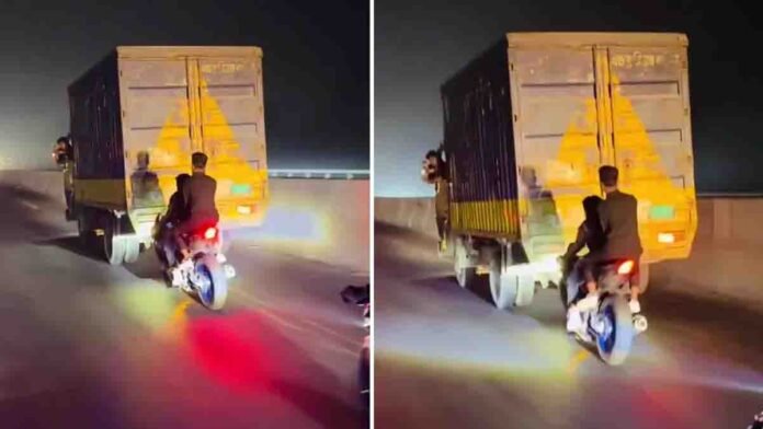 Bikers risk their lives by performing dangerous stunts in front of a speeding truck, highlighting serious road safety violations in a viral video