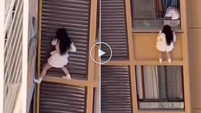 Woman Hanging From 10th Floor Balcony in China – Viral Escape After Lover’s Wife Arrives - Viral Video