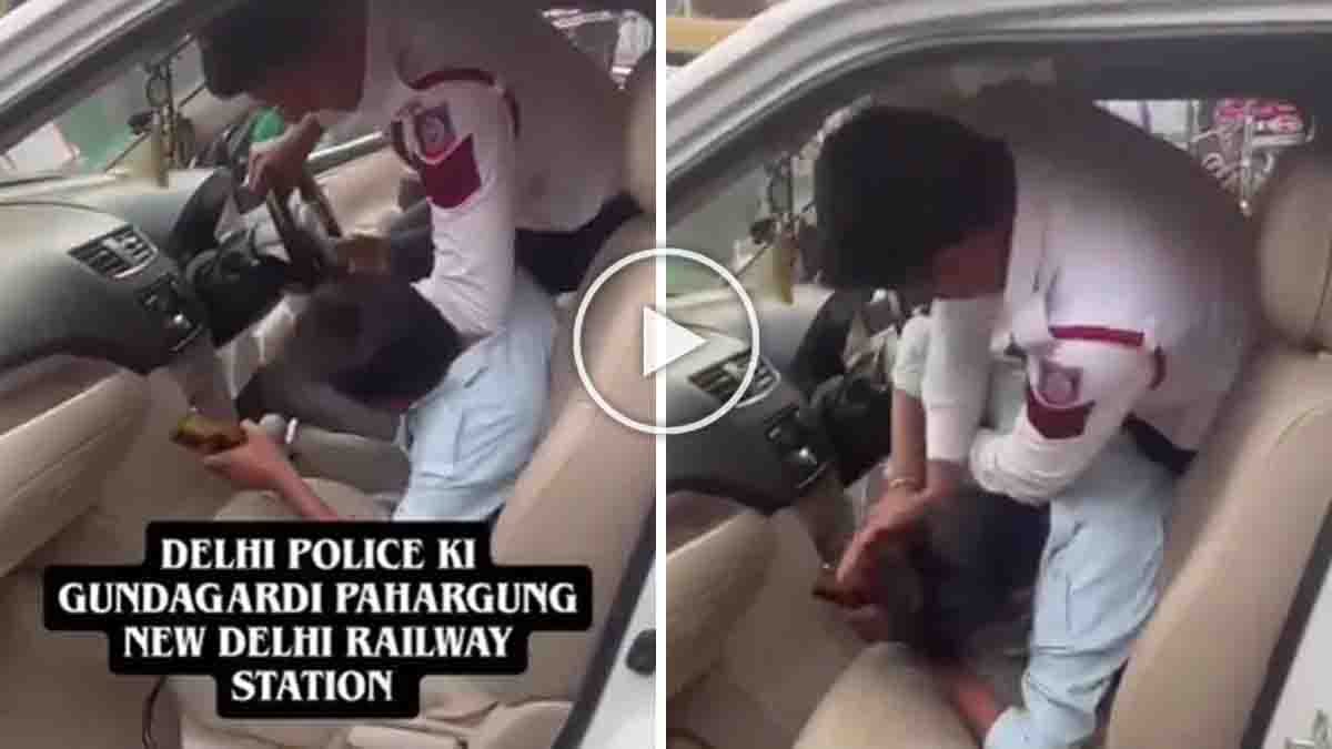 Delhi traffic police officer slapping a car driver inside a white vehicle near Paharganj railway station, viral video triggers public outrage on social media