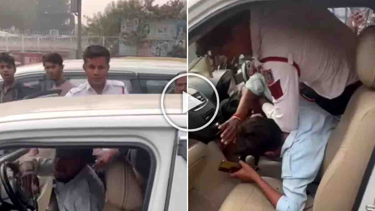 Delhi traffic police officer slapping a car driver inside a white vehicle near Paharganj railway station, viral video triggers public outrage on social media