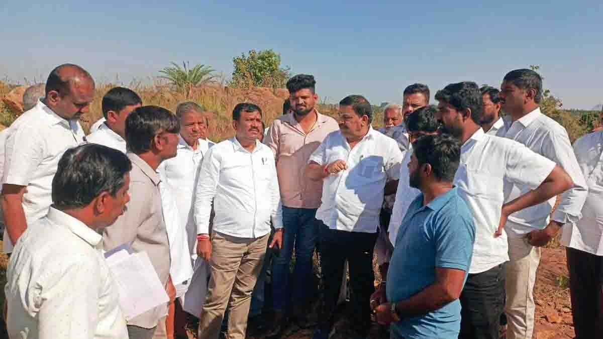 MLA S. N. Subbareddy inspecting the six-acre land sanctioned for sports stadium construction in Gudibande, Karnataka - Local News