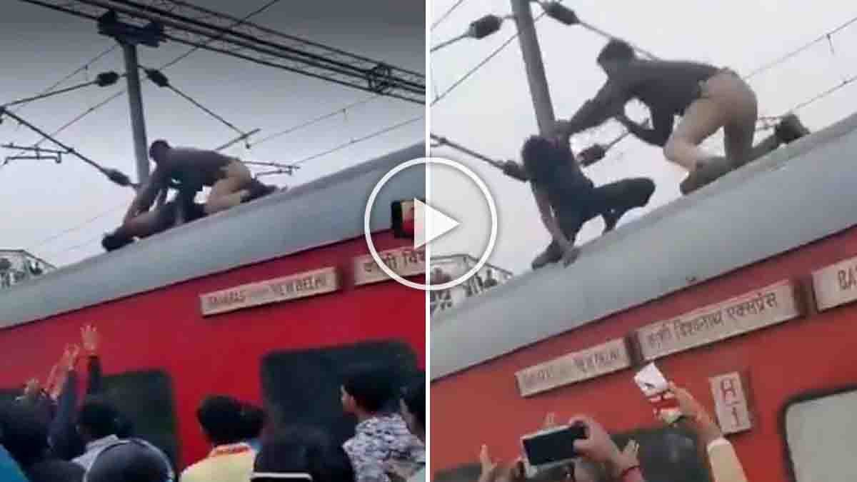 RPF jawan climbing a train roof to rescue a man before he touches overhead high-voltage wires at Mauhar Phatak railway station - Viral Video