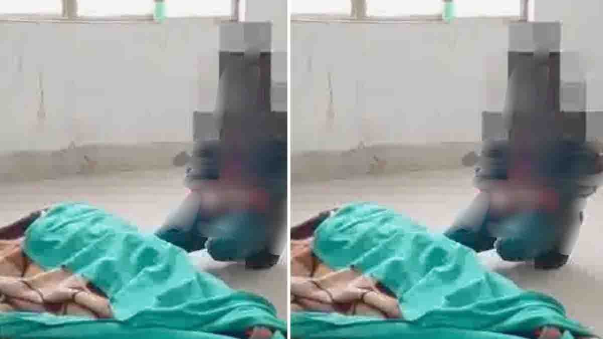 A heartbreaking moment as a 10-year-old boy sits beside his mother’s body in a government hospital in Etah, Uttar Pradesh