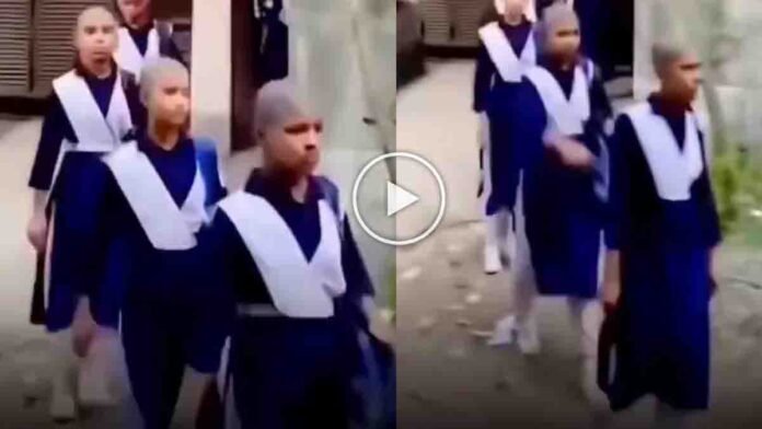 School students and teachers in Jodhpur shave their heads to support a young girl battling cancer - Viral Video