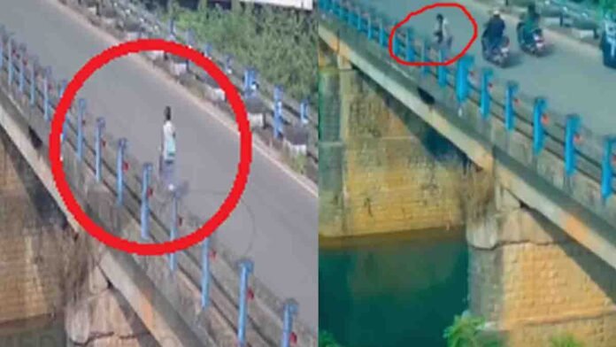 Schoolgirl wearing uniform jumps into a river from a bridge in a shocking viral CCTV video