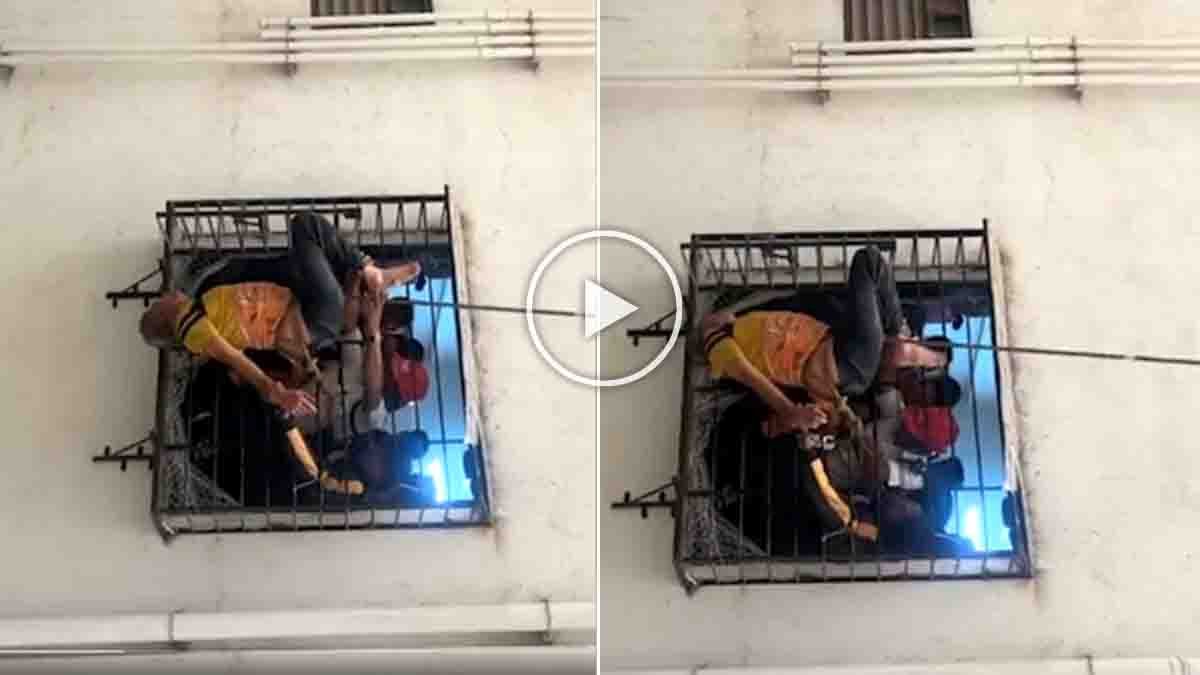 Miracle escape in Surat as man survives 10th-floor fall after getting stuck in 8th-floor window grill during fire brigade rescue