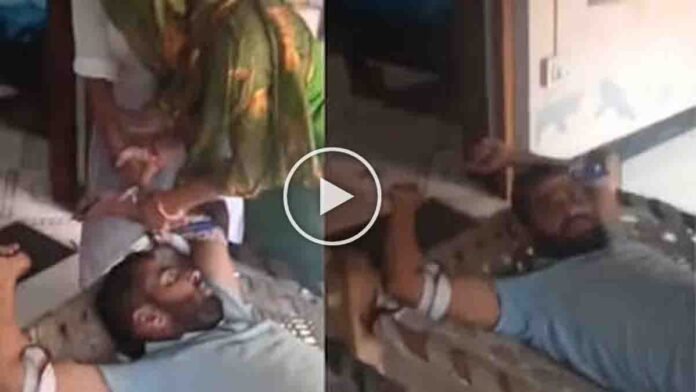 Wife tying husband to bed during domestic dispute in Aligarh, Uttar Pradesh viral video