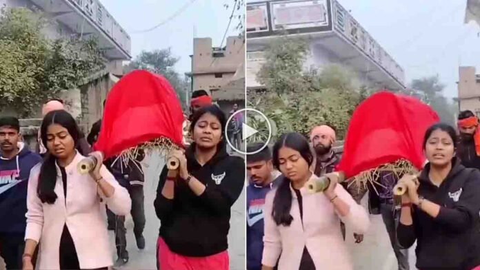 Two daughters carrying their mother’s body to the cremation ground in a Bihar village due to poverty and social neglect