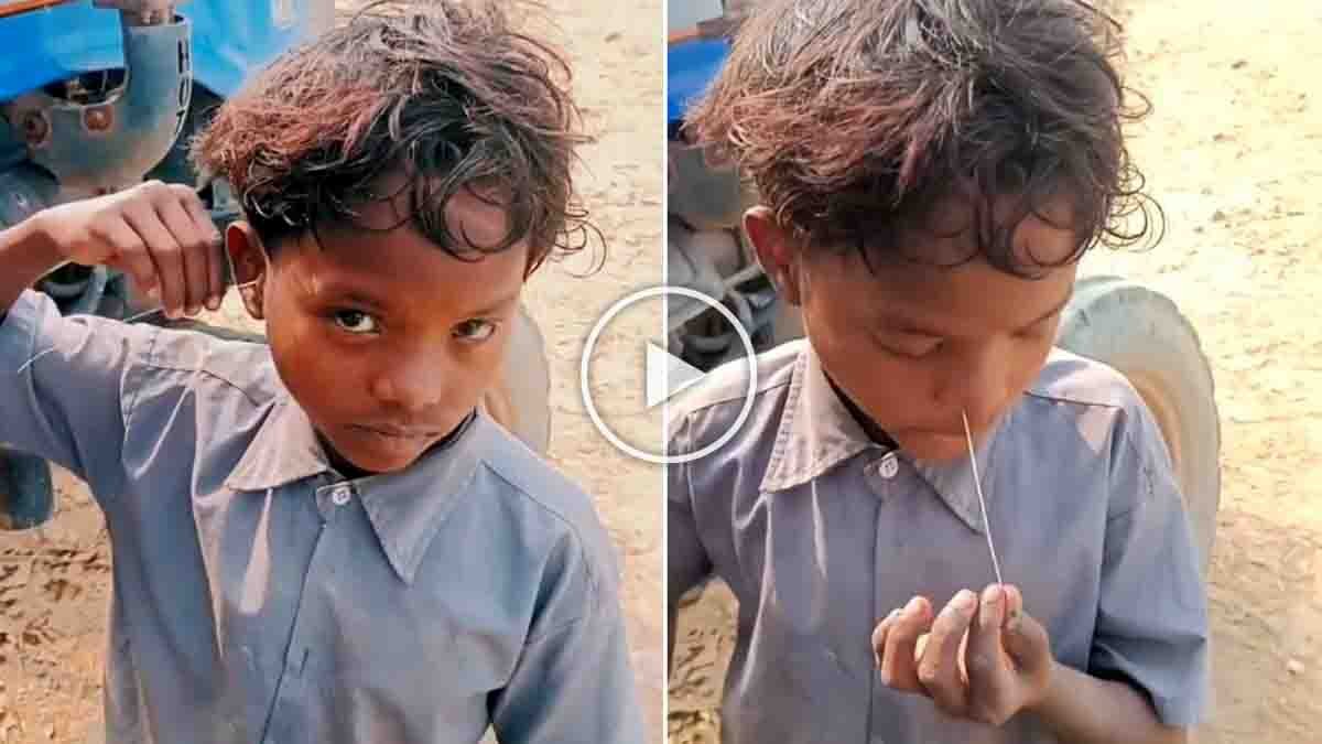 Village boy performing a shocking physical stunt by pulling a wire from his nose after inserting it in his ear, viral social media talent video from rural India.