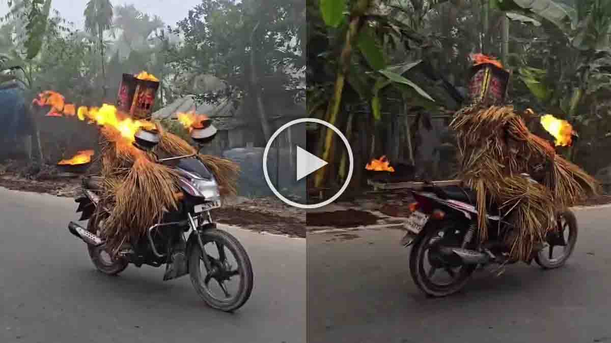 Man wrapped in dry grass sets himself on fire while riding a bike in viral stunt video