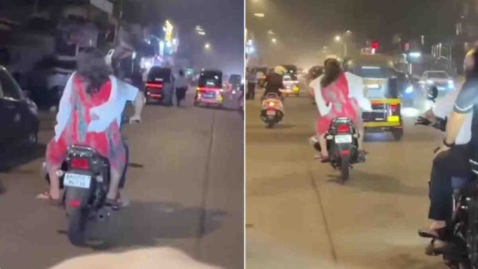 Viral video of a couple fighting on a moving bike as wife hits husband in public