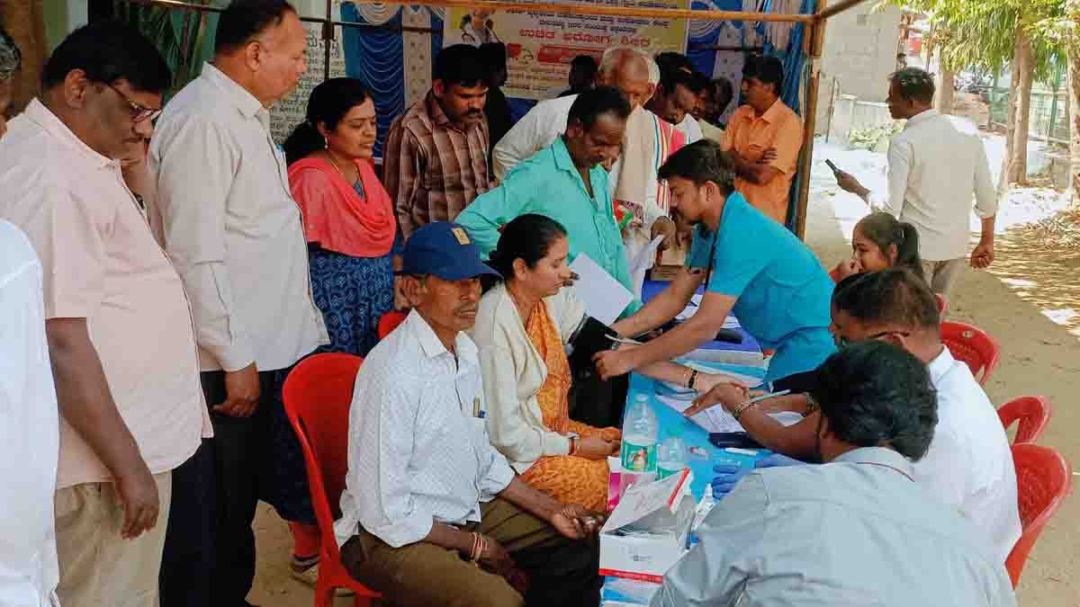Doctors providing free checkups at a Health Camp in Gudibande, Karnataka