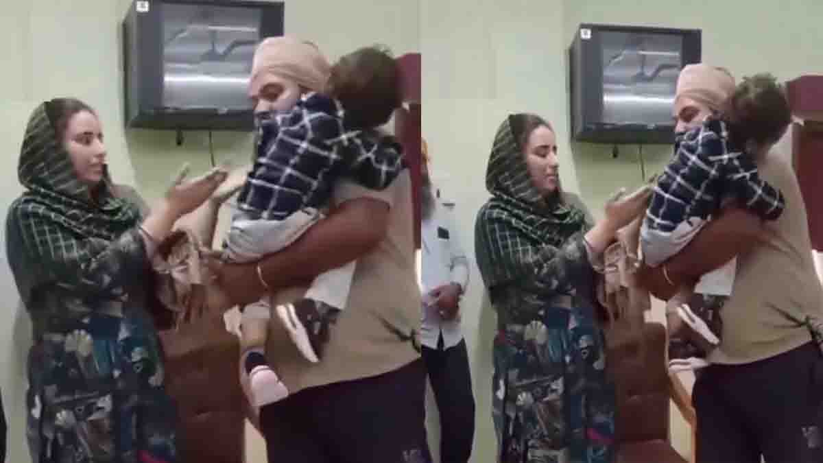 Emotional video showing a small child crying and holding his father during custody separation after divorce