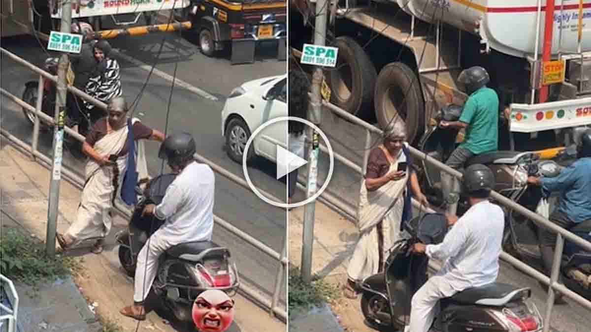 Kozhikode viral video showing elderly woman stopping biker riding on pedestrian footpath at Eranhipalam signal