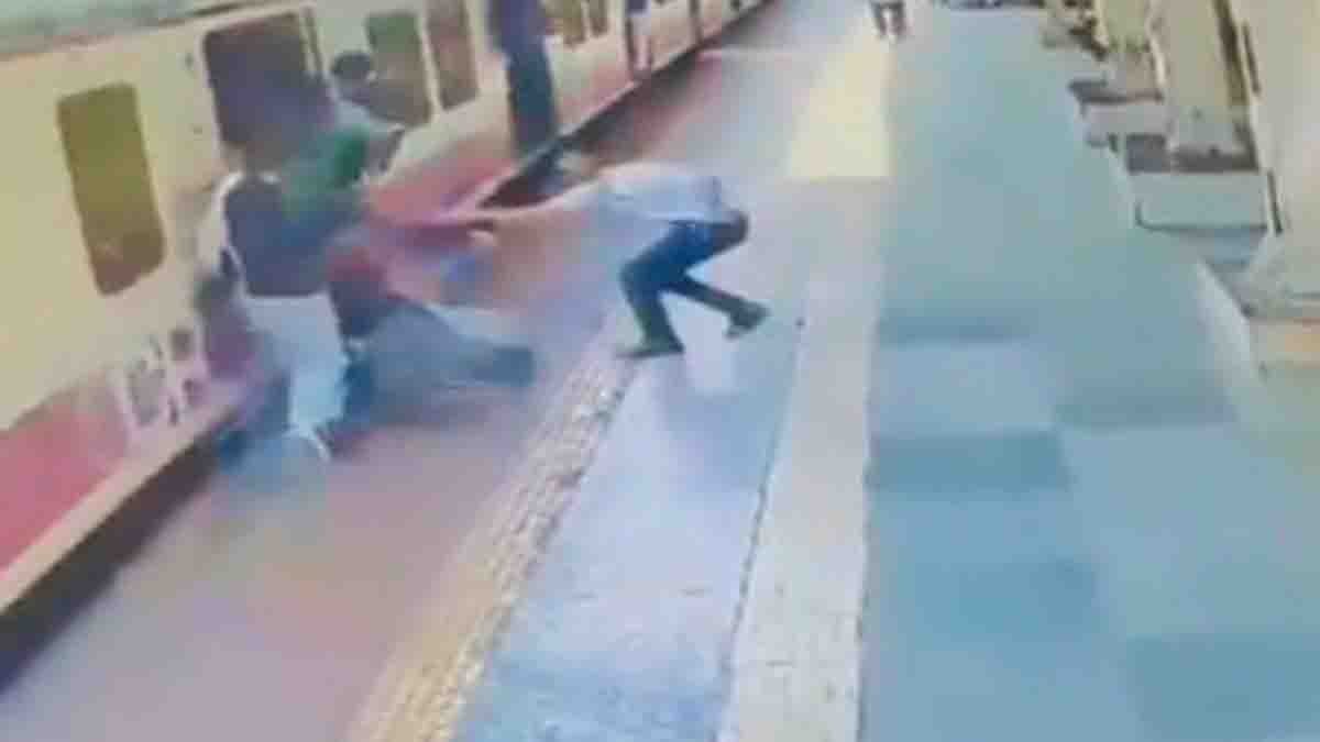 Mumbai Local Train Hero ticket checker rescues elderly passenger from falling between train and platform at Kurla station