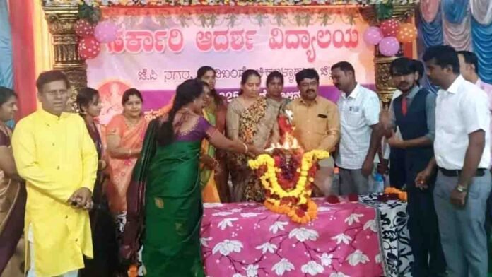 Students attending sslc-farewell ceremony at Adarsha Vidyalaya in Gudibande with BEO addressing the gathering