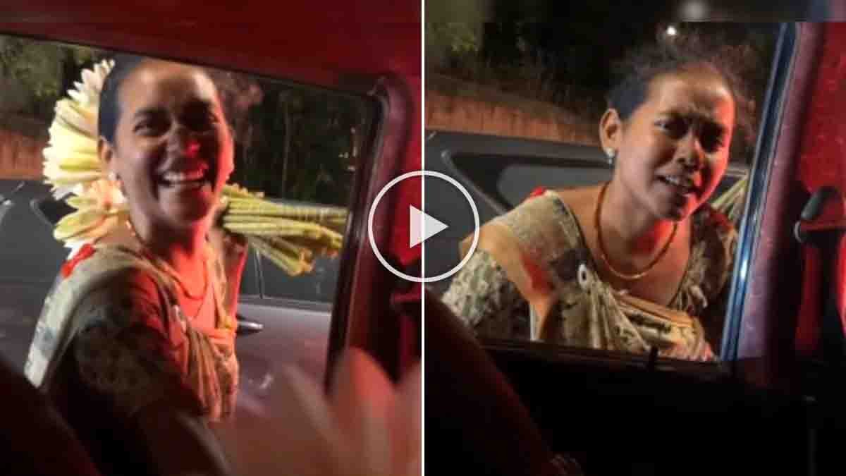 Viral Video : ಟ್ರಾಫಿಕ್ ಸಿಗ್ನಲ್ನಲ್ಲಿ ಹೂವು ಮಾರುವ ಹುಡುಗಿಯ ನಗು ಮತ್ತು ಆಕೆಯ ಮಾತುಗಳಿಗೆ ನೆಟ್ಟಿಗರು ಫಿದಾ! 2 Viral video shows young flower seller smiling at traffic signal and offering flowers with kindness and humanity