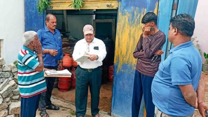 Gas Cylinder Raid officials seizing illegal LPG cylinders in Gudibande residential area