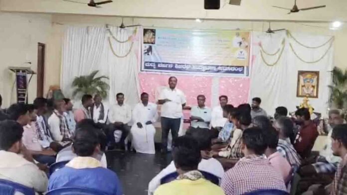 Village leader addressing public at Anti-Liquor Awareness Camp organized in Beechaganahalli village, Gudibande taluk, Chikkaballapur district, Karnataka