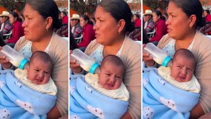 Mother accidentally putting milk bottle in baby’s ear while watching stage performance viral video moment