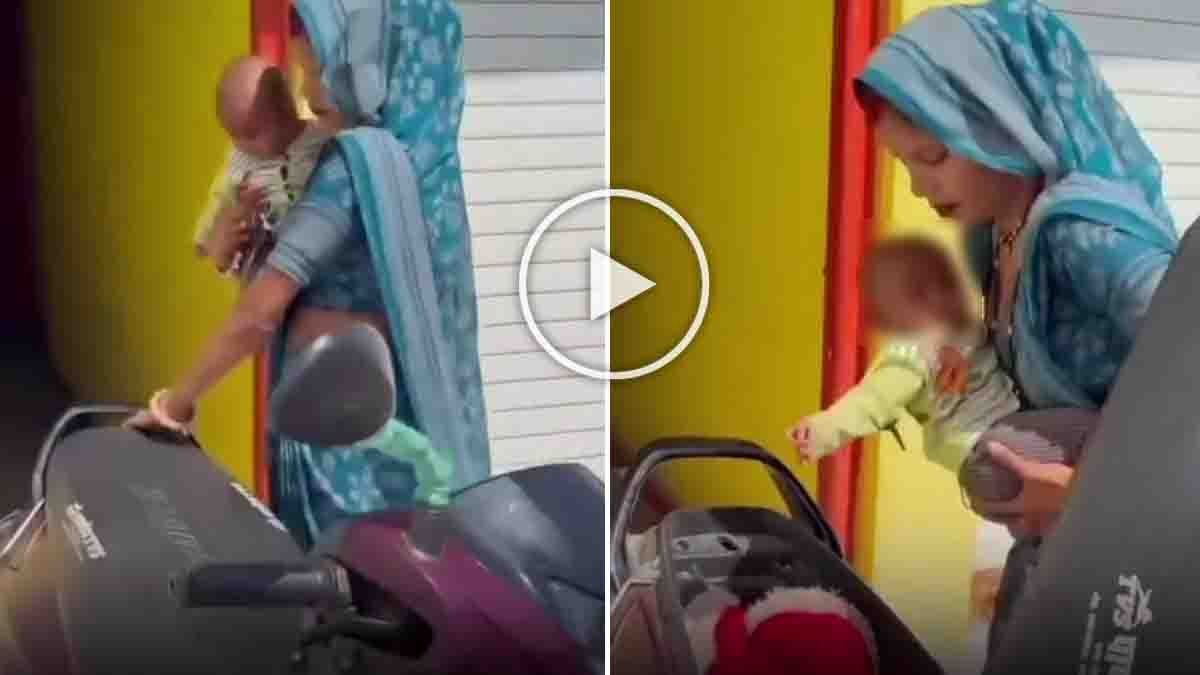 viral video woman placing baby inside scooter diggi storage compartment shocking incident