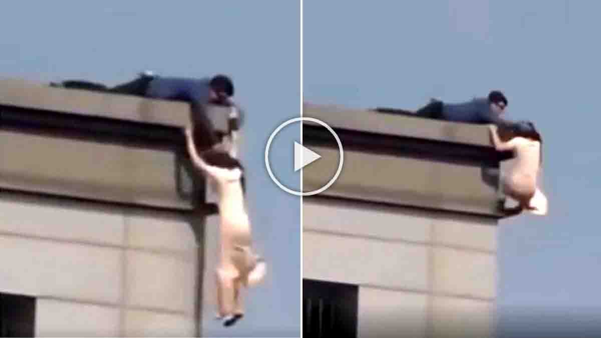 Man saves woman from falling off 20th floor building in Seoul dramatic rescue - Viral Video
