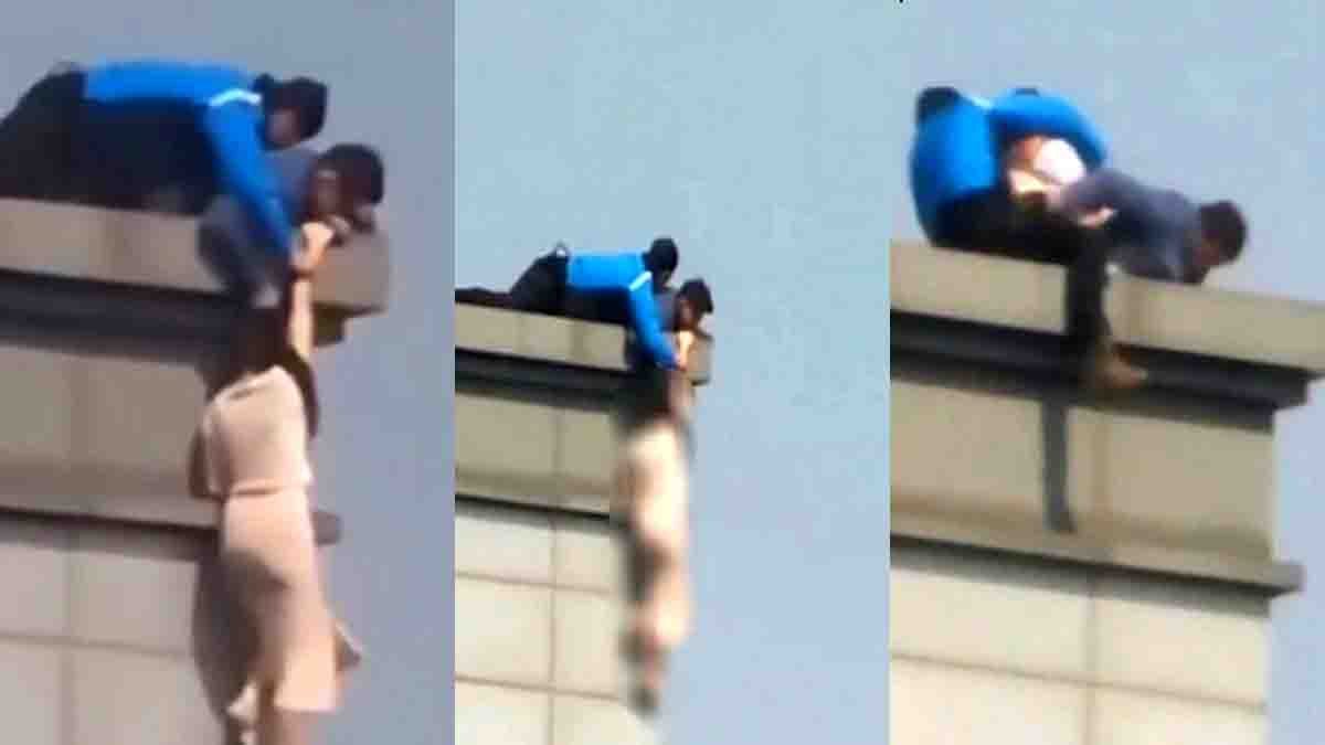 Man saves woman from falling off 20th floor building in Seoul dramatic rescue - Viral Video