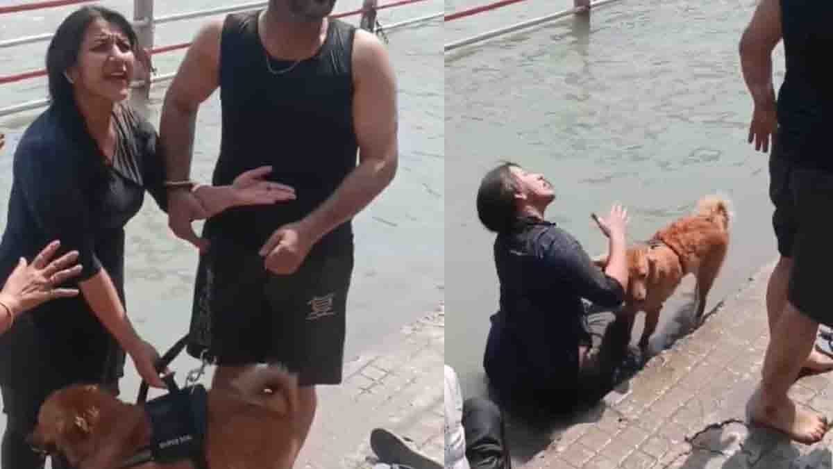 Haridwar Dog Bath Controversy woman bathing pet dog in Ganga river at Har Ki Pauri