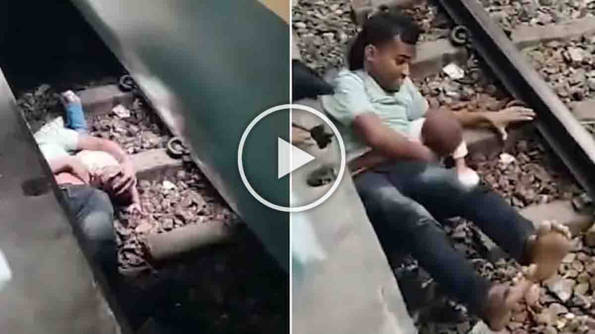 viral train rescue video showing father saving baby from gap between moving train and platform