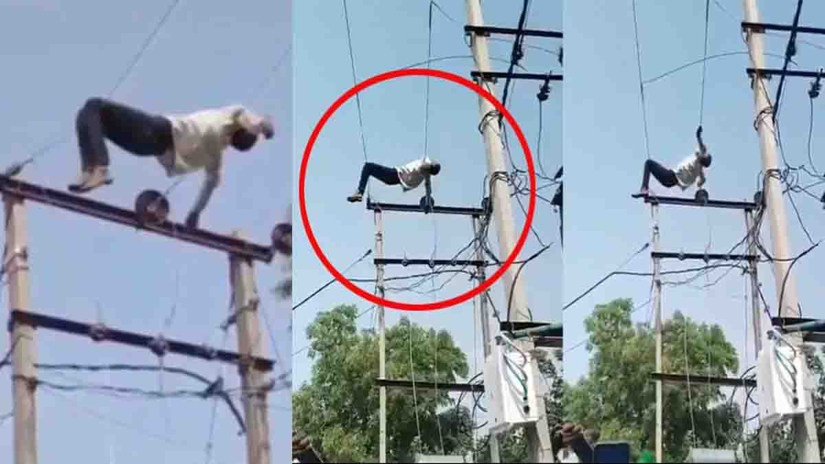 Drunk Man Viral Video showing an intoxicated man lying on 11 KV high-voltage power lines in Uttar Pradesh while villagers watch in shock.