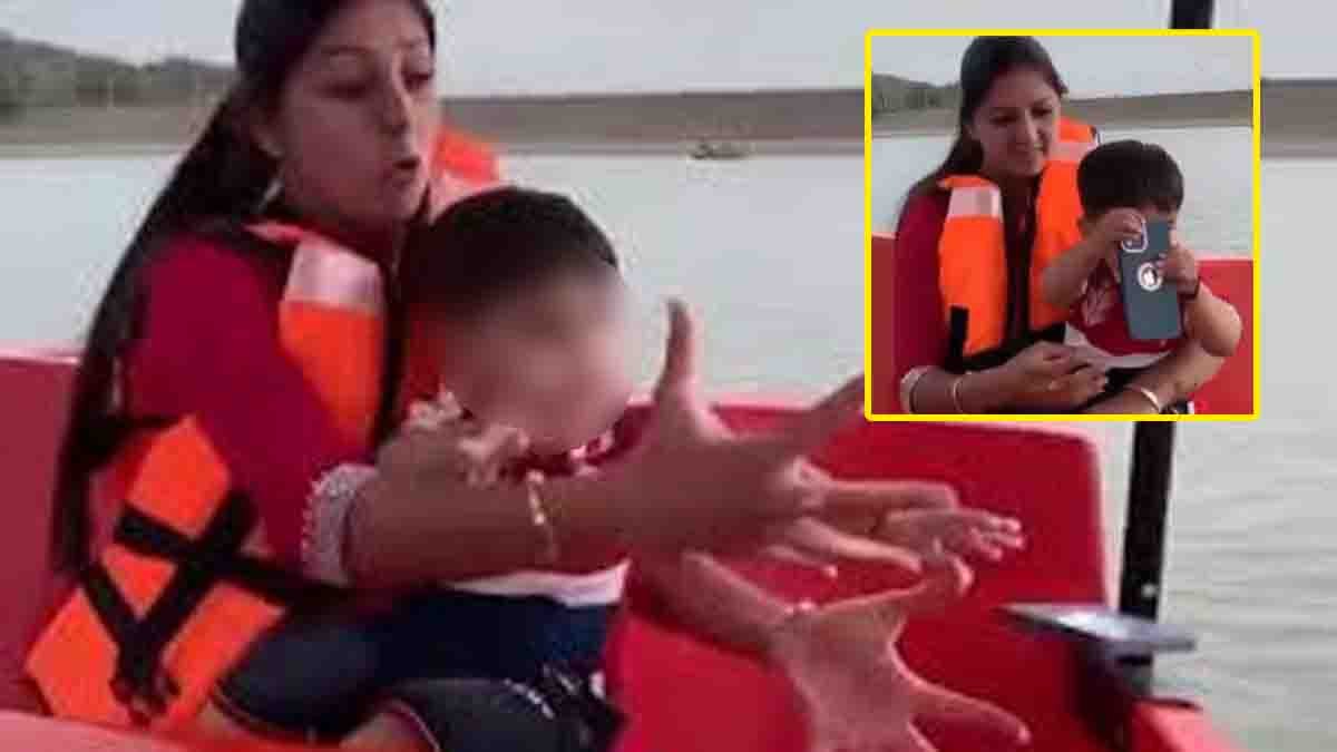 Funny video of a child throwing his mother's expensive iPhone into a lake during a boat ride