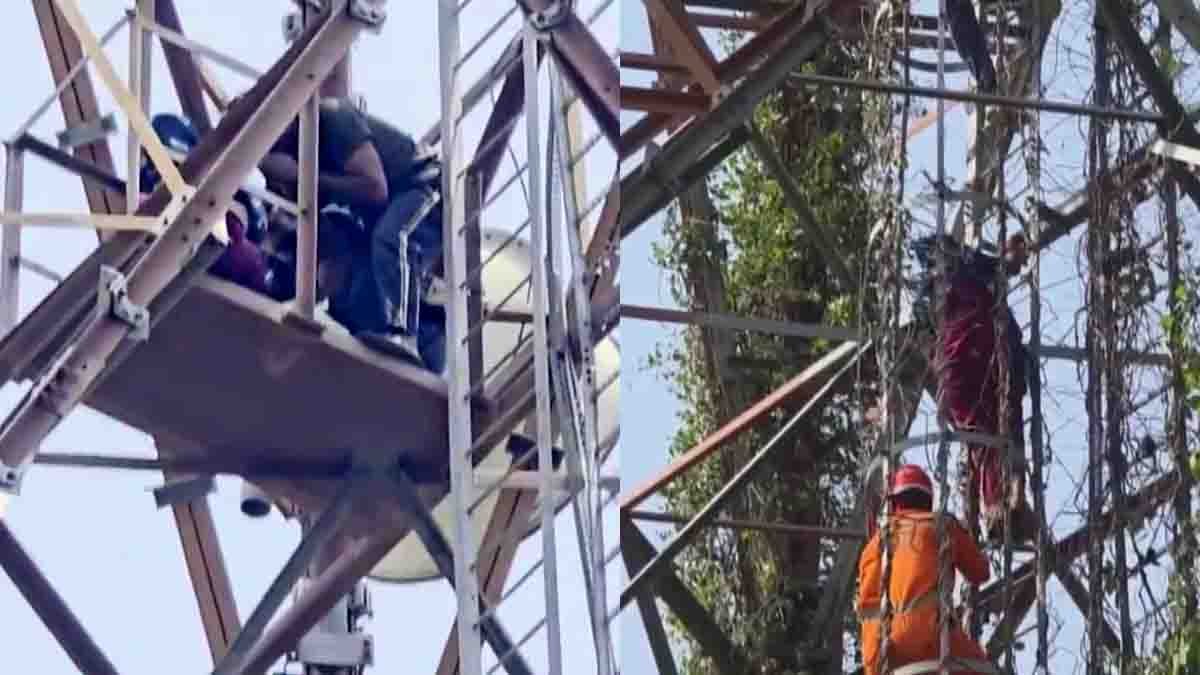 Gonda woman video showing a mother sitting atop a 120-foot mobile tower with her five-year-old child during a dramatic rescue operation in Uttar Pradesh.
