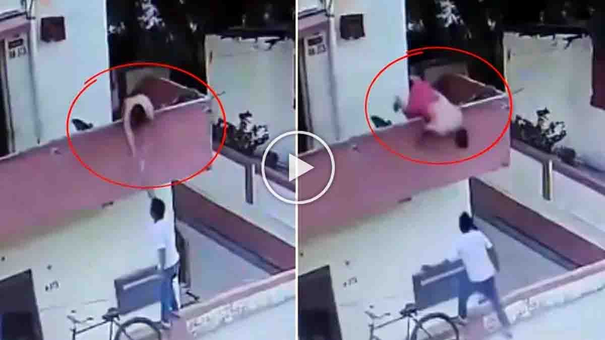 Ice Cream Viral Video showing a man falling from a first-floor balcony while reaching for ice cream from a street vendor below.