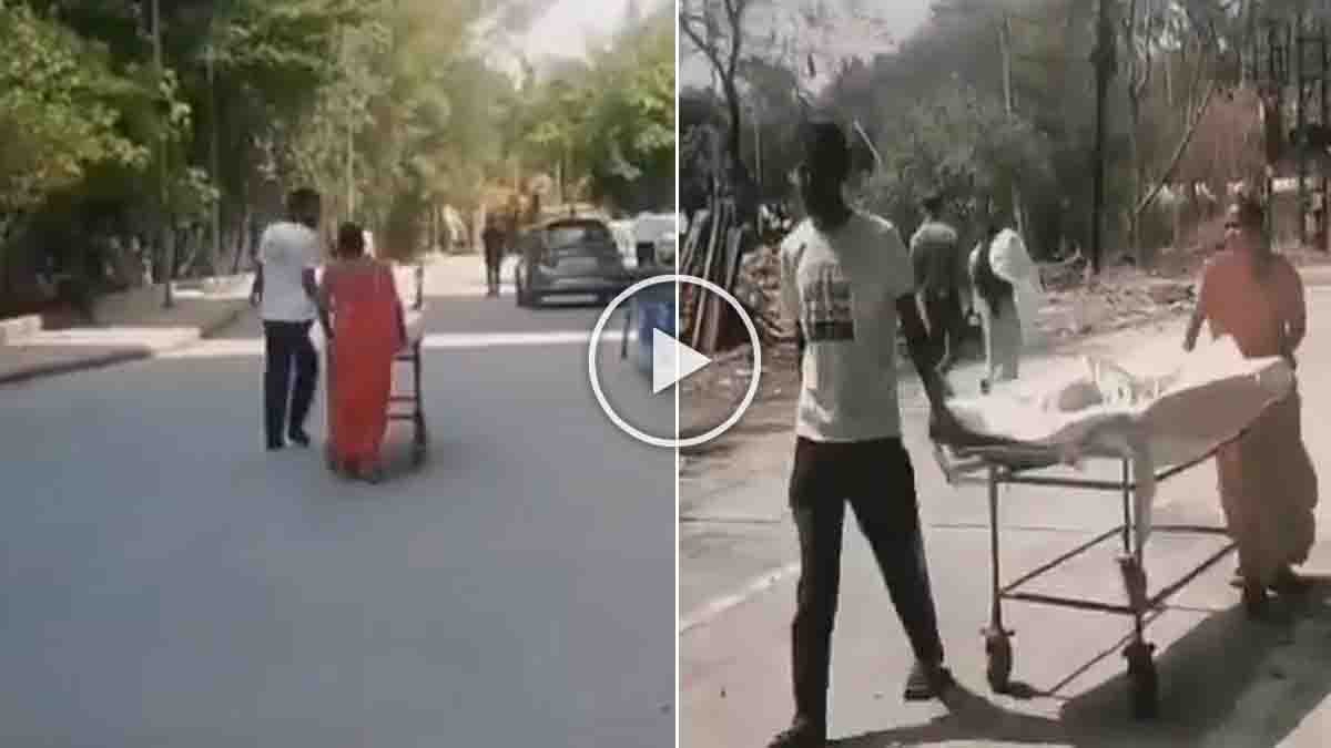 Indore Hospital Incident showing parents pushing their sick son on a stretcher after an ambulance was unavailable at a government hospital.