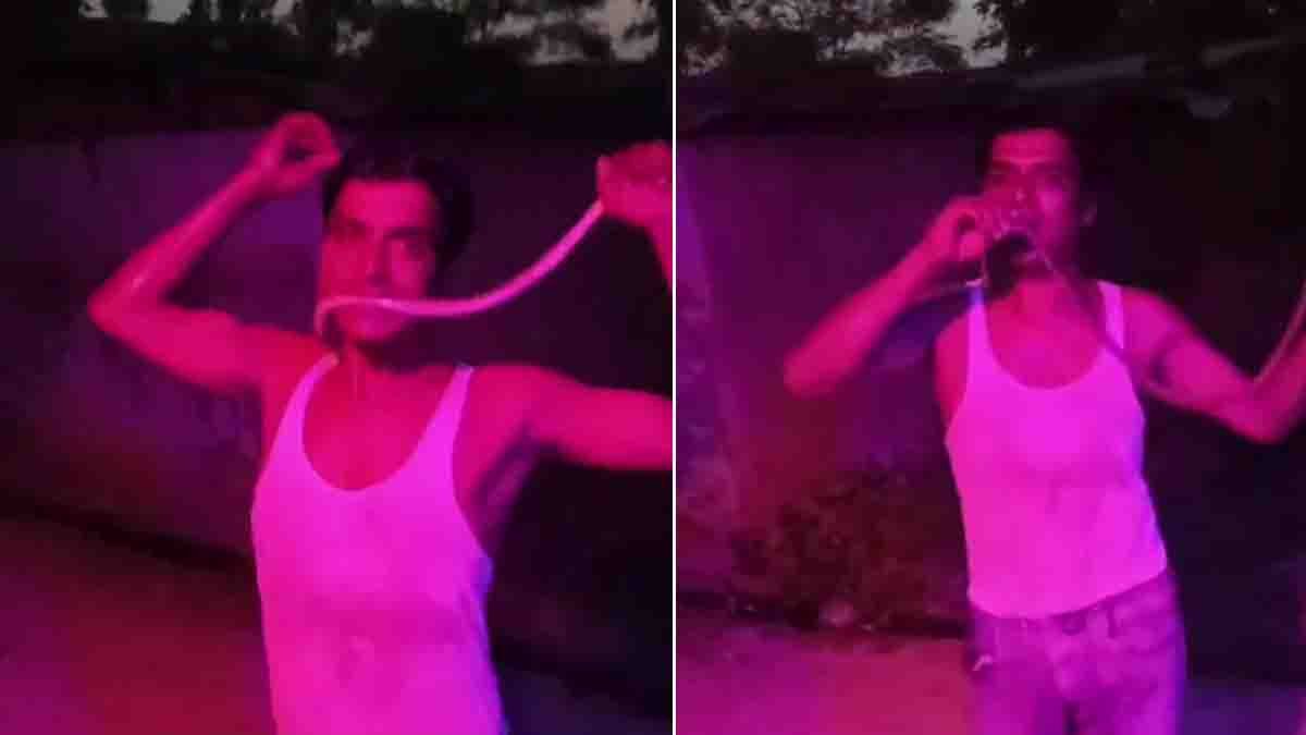 Viral Video showing a young man putting a dead snake in his mouth while filming a social media reel before being hospitalized.