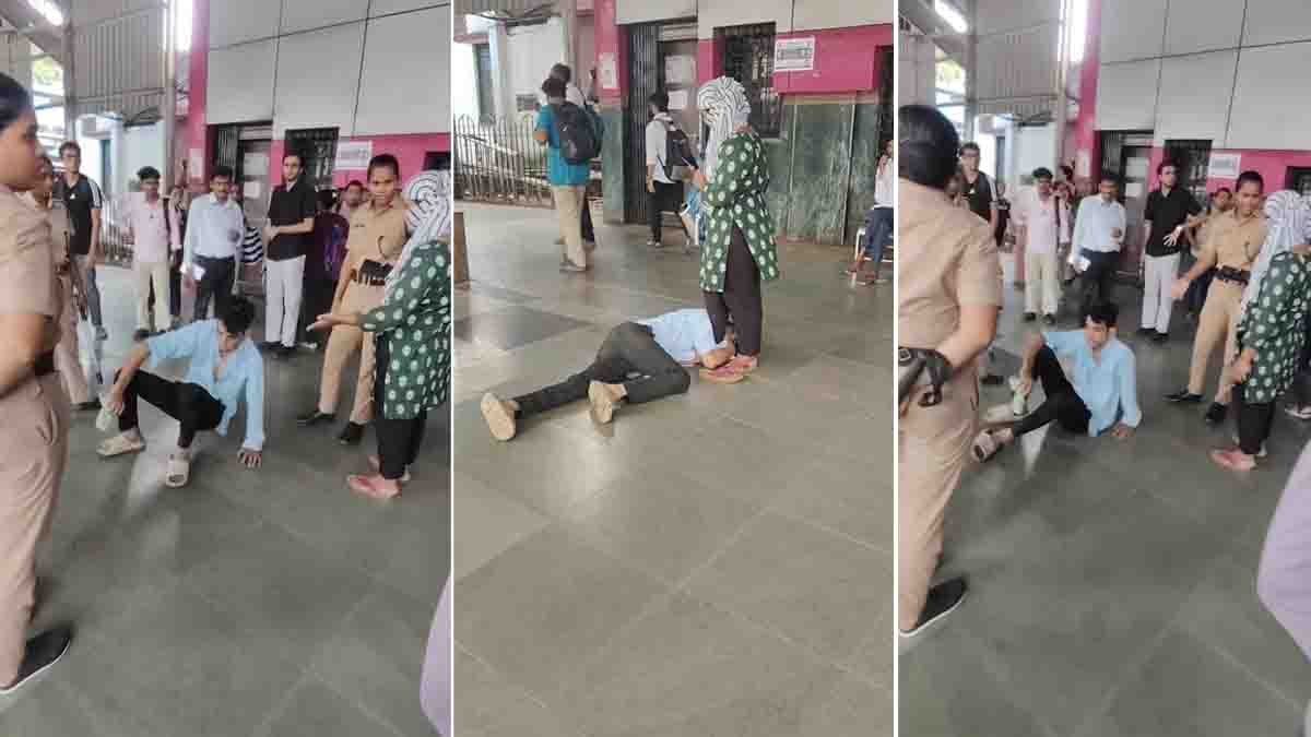 Borivali Viral Video showing a young man holding a woman's legs at Mumbai's Borivali Railway Station as police intervene during the viral incident.