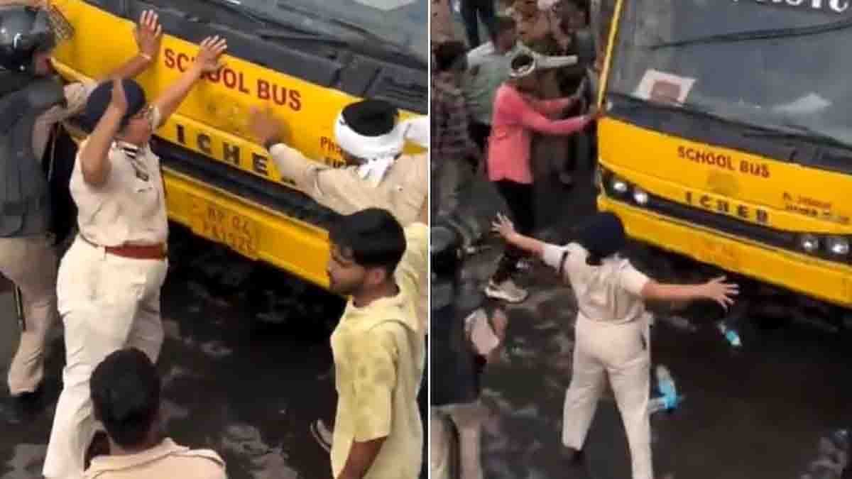 ACP Monika Shukla standing in front of a bus during the Bhopal farmers' protest as protesters gather behind her in a viral video.