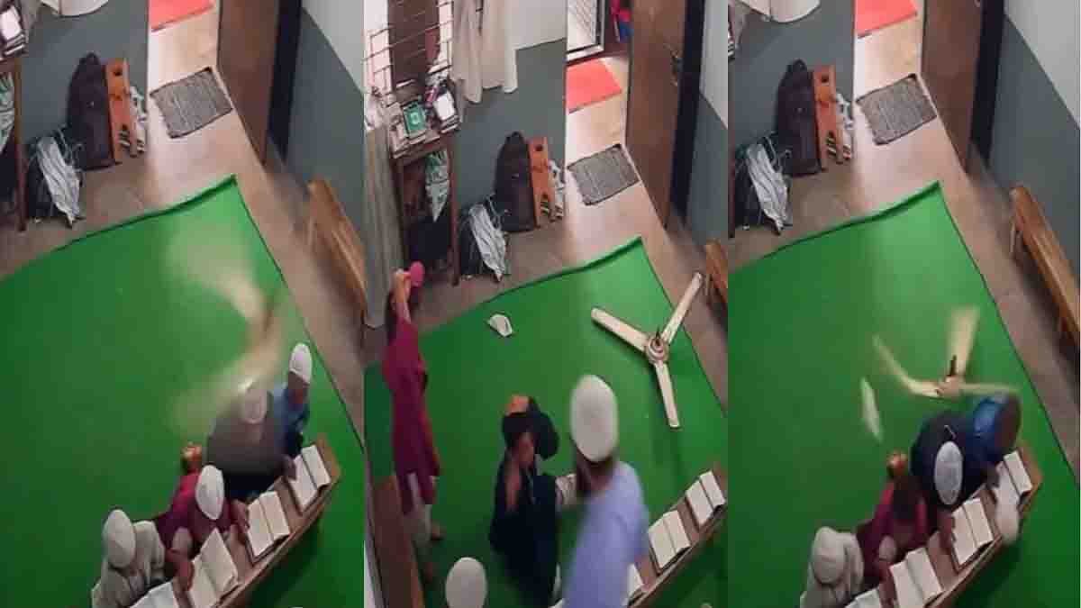 Madrasa Ceiling Fan Accident : ಬೆಚ್ಚಿಬೀಳಿಸುವ ವೈರಲ್ ವಿಡಿಯೋ: ಮದರಸಾದಲ್ಲಿ ಕುರಾನ್ ಓದುತ್ತಿದ್ದ ಮಗುವಿನ ಮೇಲೆ ದಿಢೀರ್ ಉರುಳಿದ ಸೀಲಿಂಗ್ ಫ್ಯಾನ್! 1 Madrasa ceiling fan accident as a ceiling fan falls on a child during Quran recitation