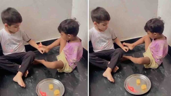 Sister ties rakhi to her brother using her feet during Raksha Bandhan