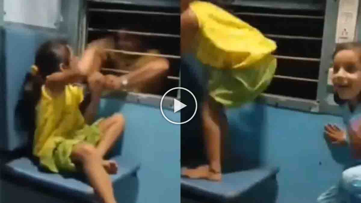 Train Viral Video showing a thief snatching a girl’s mobile phone through a train window