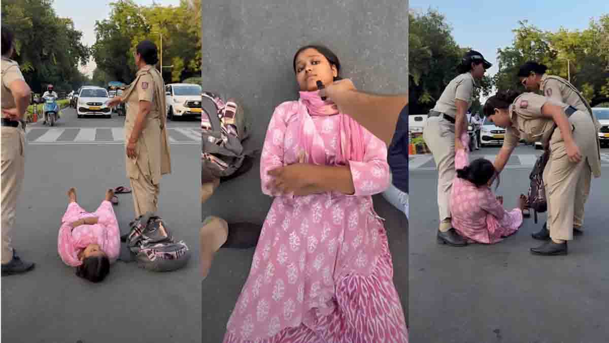 Thalapathy Vijay fan viral video showing a woman lying on a Delhi road